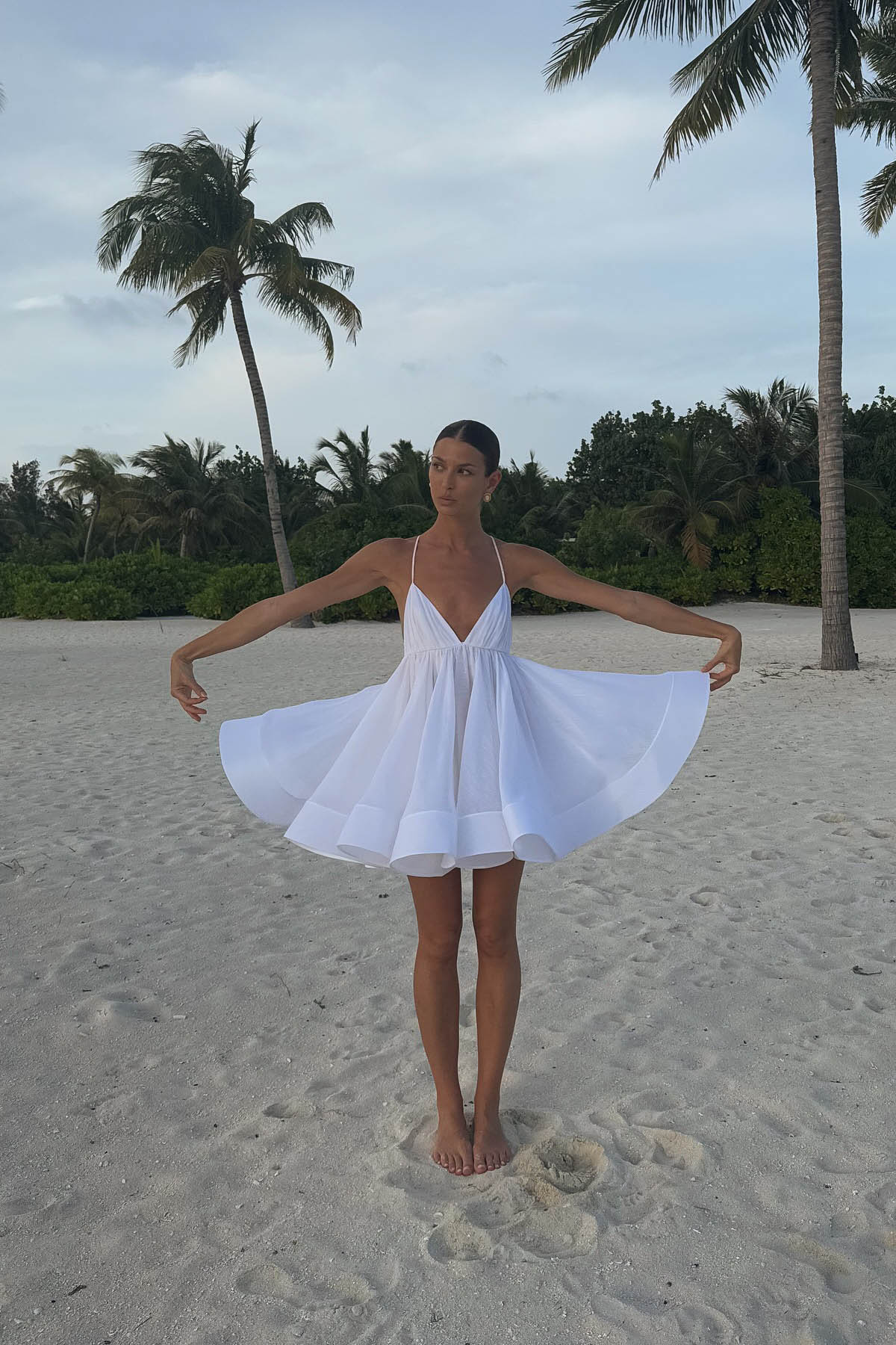 Backless Mini Dress with Flared Hem and Deep V Neckline