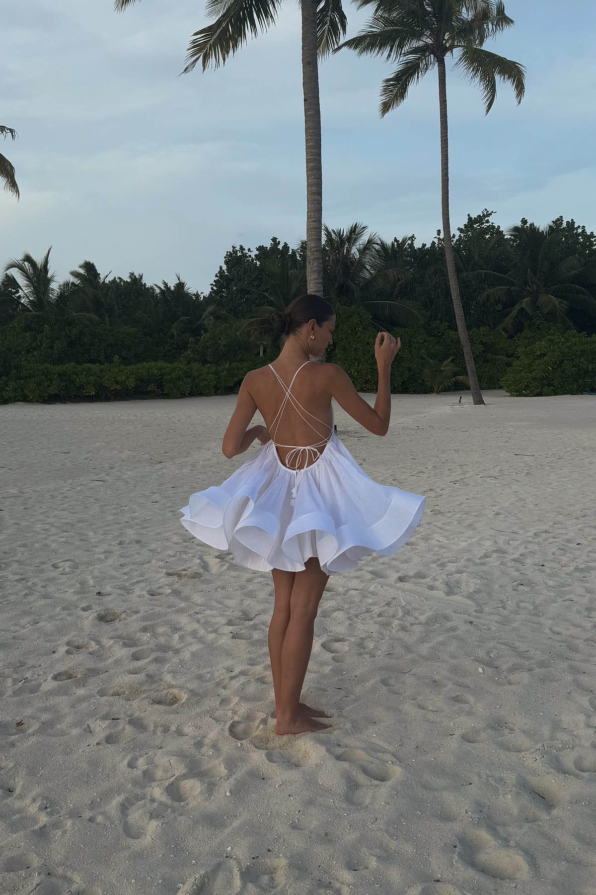 Backless Mini Dress with Flared Hem and Deep V Neckline