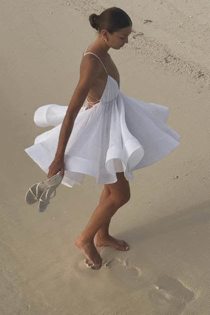 Backless Mini Dress with Flared Hem and Deep V Neckline